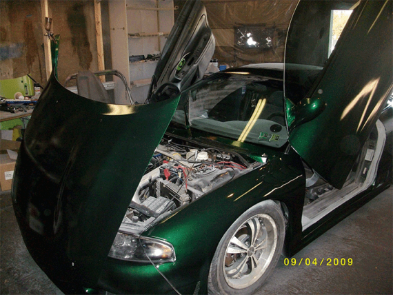 This Emerald Green Metal Flake Paint By Karetakers Kustoms is awesome.