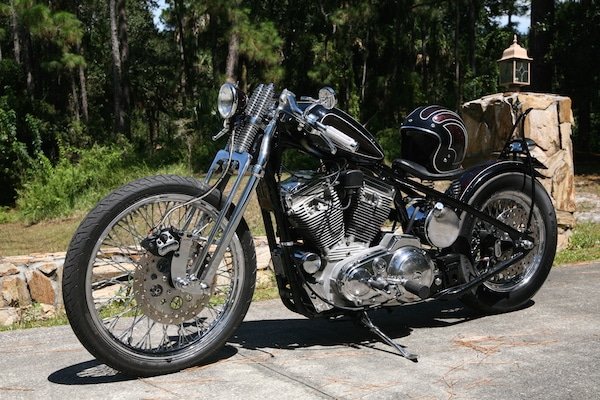 Black Harley. But this is not just a Black Harley, This is an Apple Red Metal Flake Sportster.