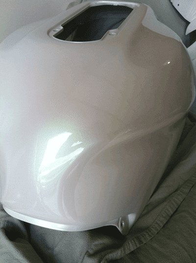 Green Shimmer Ghost Pearl Custom Painted Motorcycle tank.